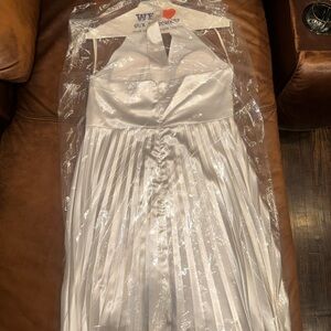 White pleated dress.